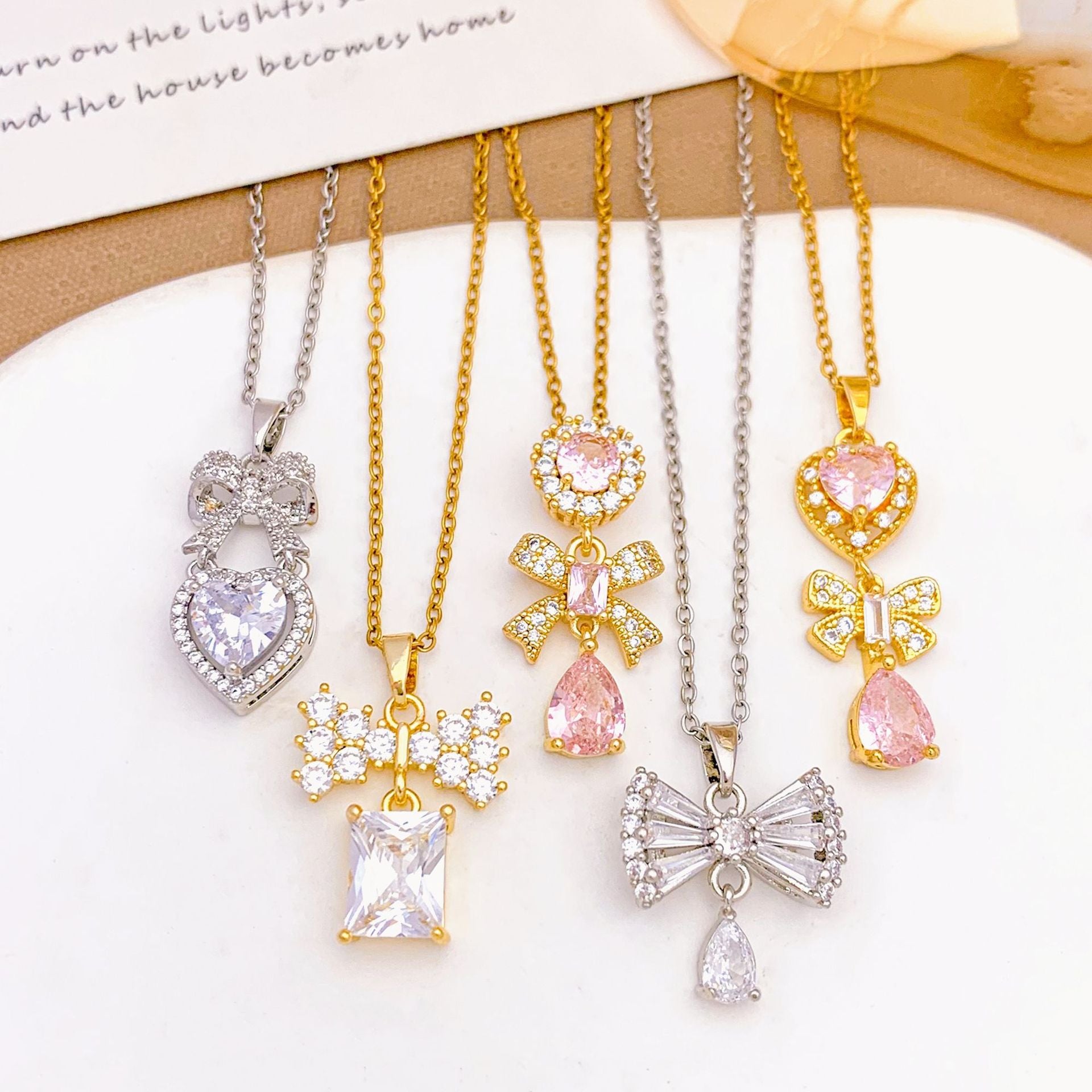 Wholesale Pink heart-shaped bow with diamond studded titanium steel necklace