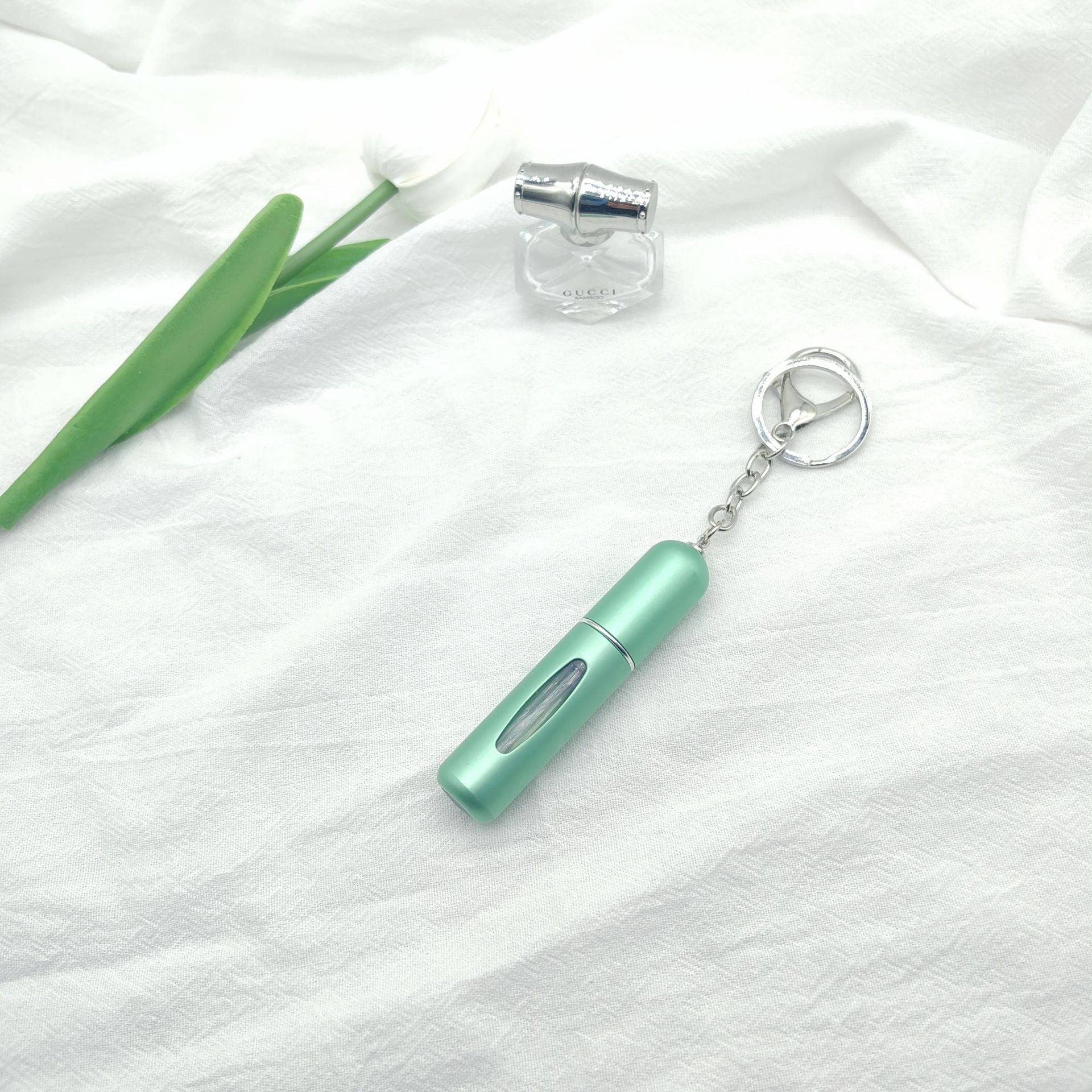 Wholesale bottom filling pump 5ml high color value sample key chain perfume bottle