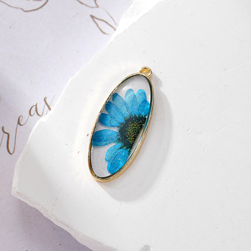 Wholesale 10pcs/pack Oval Glitter Daisy Dried Flower Flower Pendant DIY Alloy Epoxy Plant Earrings Necklace Keychain Accessories