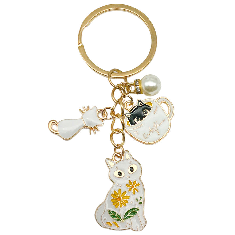 Wholesale Cartoon Oil Dropping Pearl Tea Cup White Cat Keychain Metal Alloy Bag Jewelry Pendant