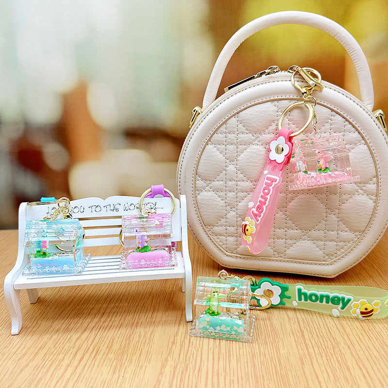 Wholesale Cute Dinosaur House Floating Quicksand Acrylic Liquid Keychain