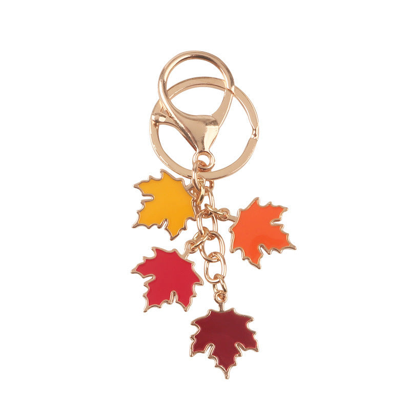Wholesale Zinc Alloy Pearl Maple Leaf Car Keychains