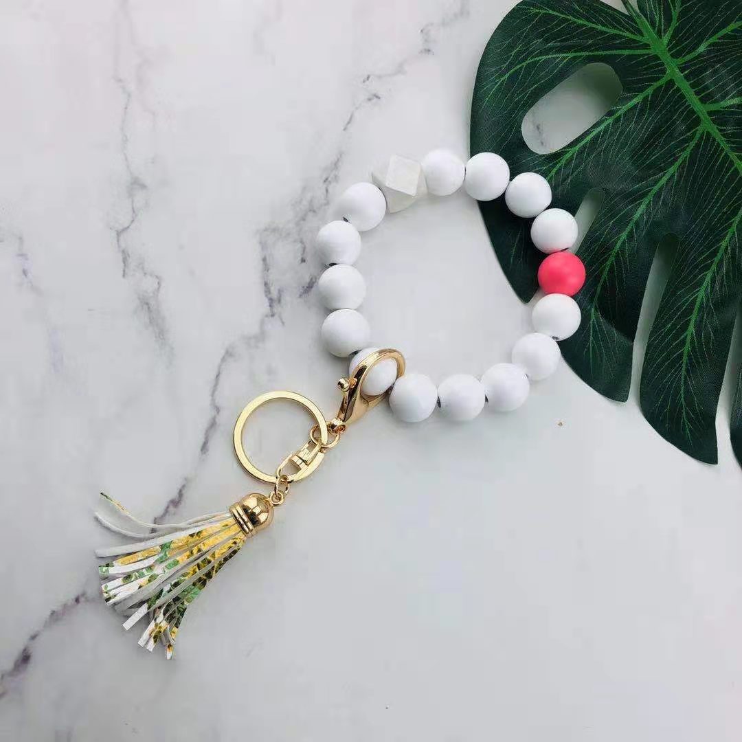 Llavero de muñeca con cuentas de silicona al por mayor