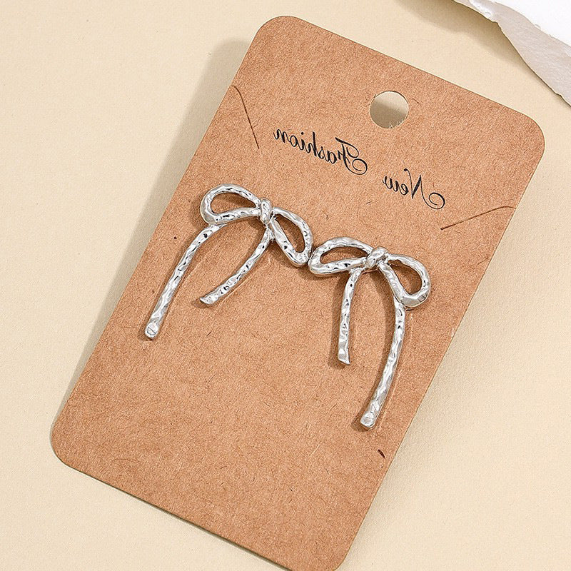 wholesale new INS metal style simple hollow bow earrings