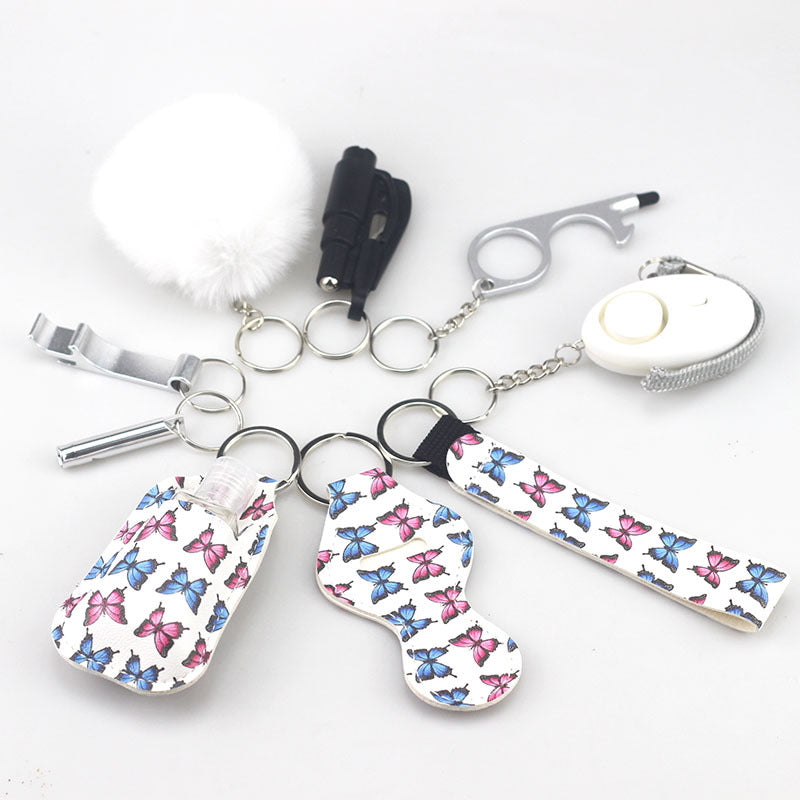 Wholesale Bottle Opener Whistling Hand Sanitizer Leather Case Wool Ball Key Chain Set