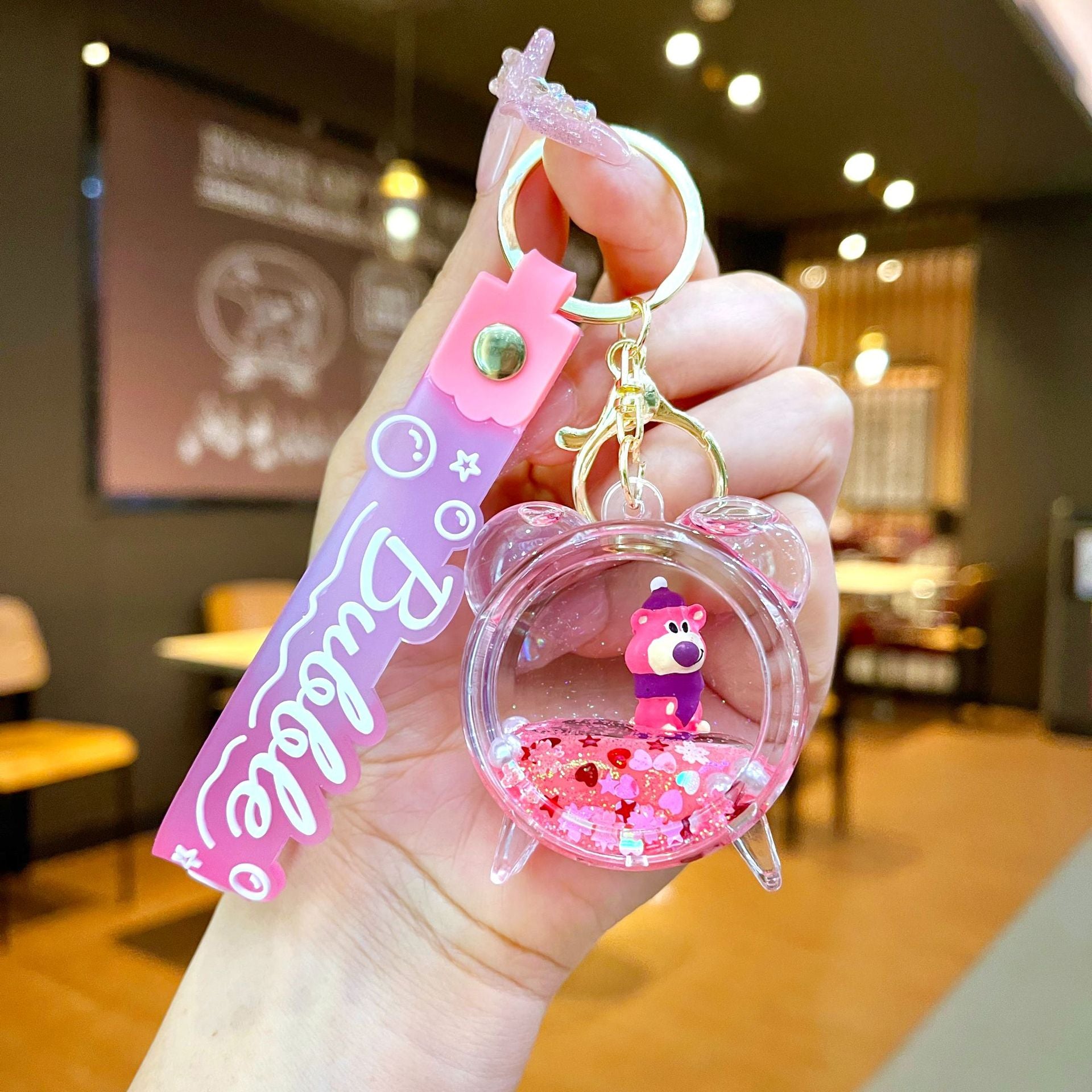 Wholesale Oil filled pink strawberry bear quicksand Keychains