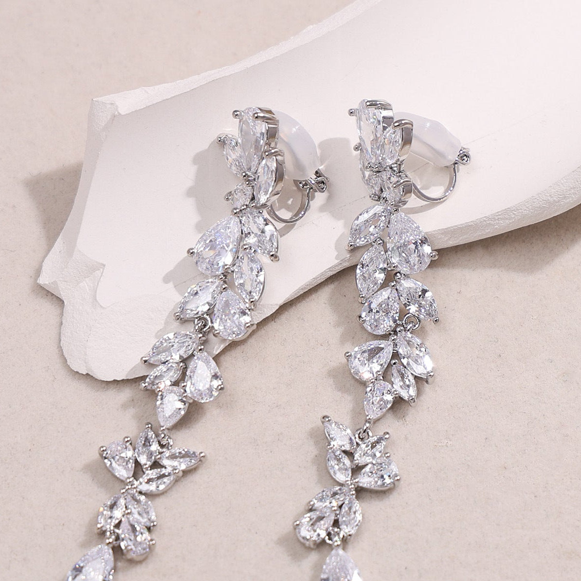 Wholesale Copper inlaid zircon intricate leaf earrings