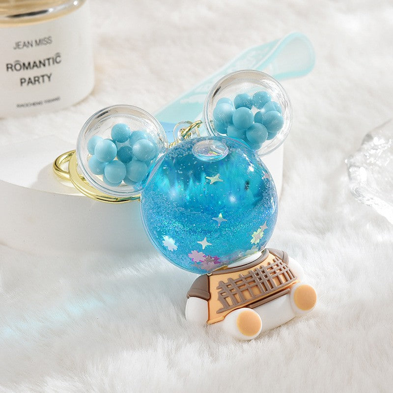 Wholesale Acrylic flowing sand bottle bag keychain