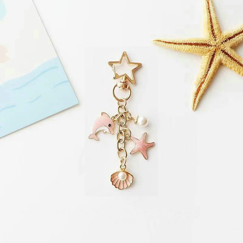 Lindo llavero de metal de estrellas de mar de delfines al por mayor