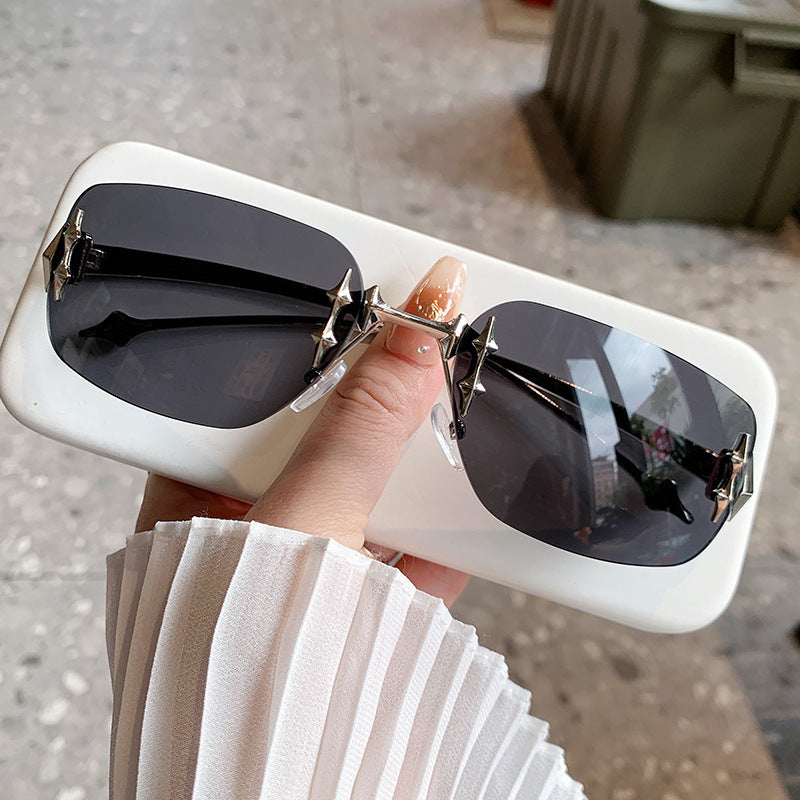 Wholesale Frameless cut edge sunglasses metal glasses star sunglasses
