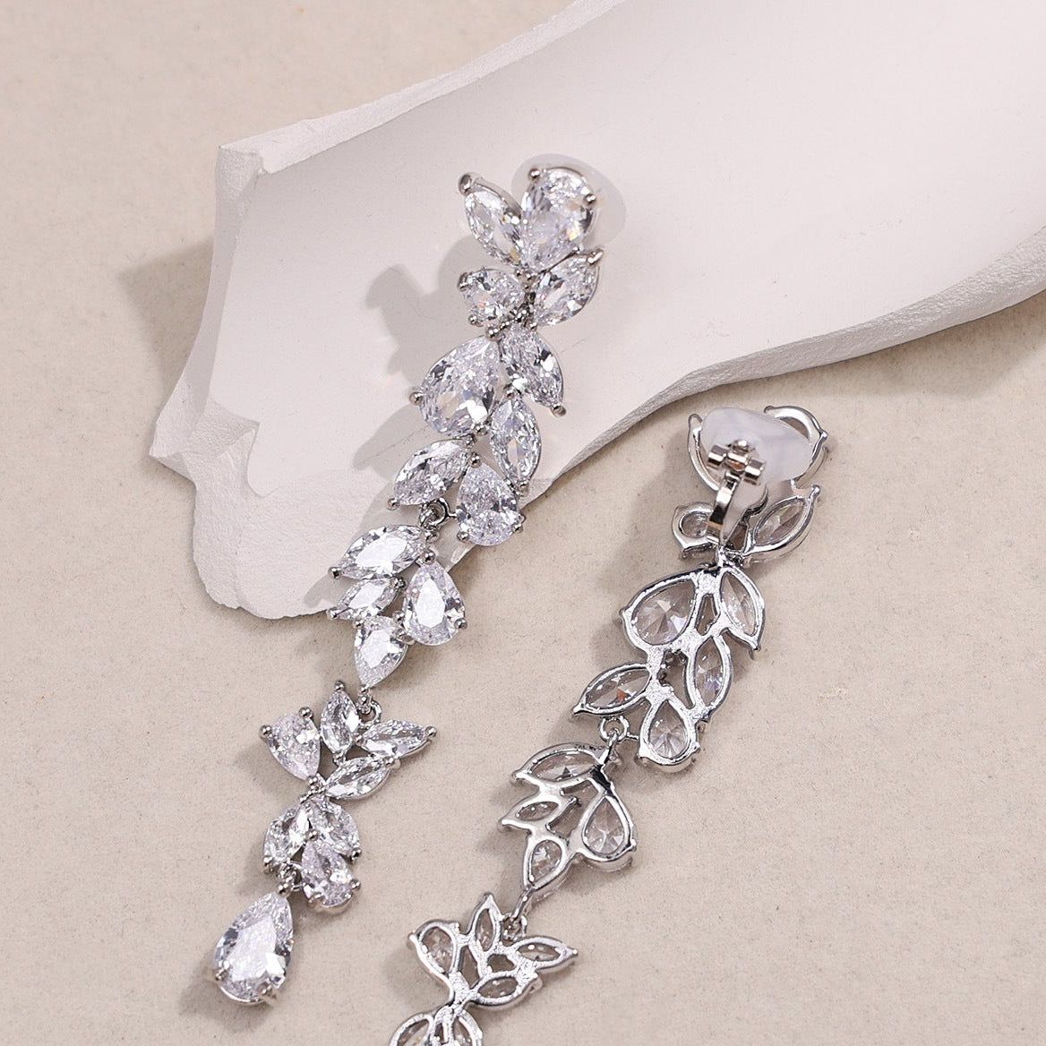 Wholesale Copper inlaid zircon intricate leaf earrings
