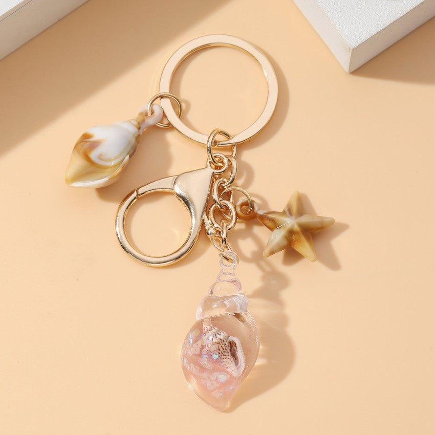 Wholesale Seaside vacation luminous conch Acrylic keychain