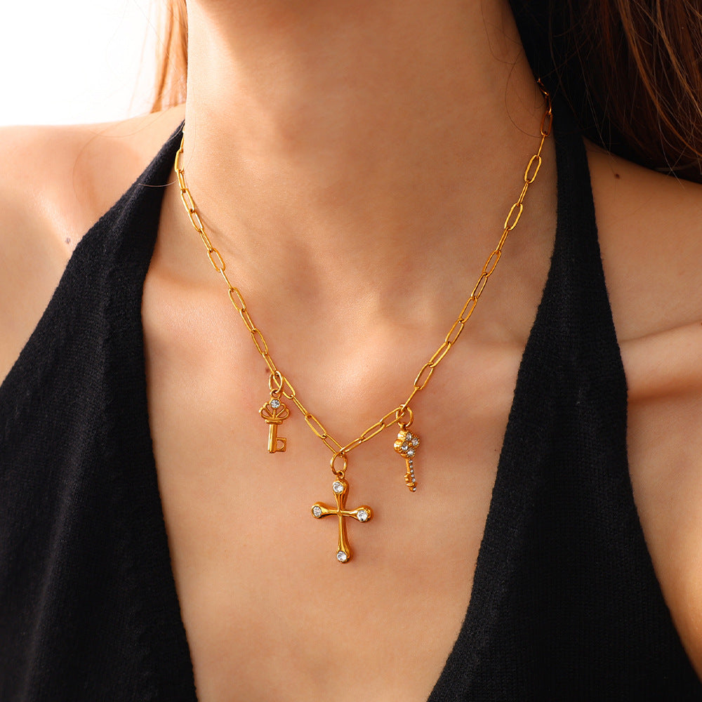 Wholesale Stainless steel gold-colored diamond-studded key cross pendant
