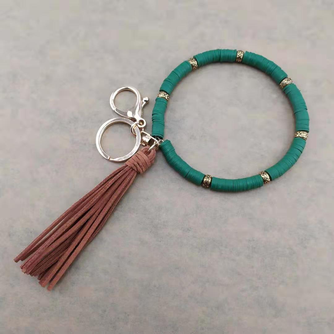 Llavero de muñeca de borla de arcilla colorida al por mayor