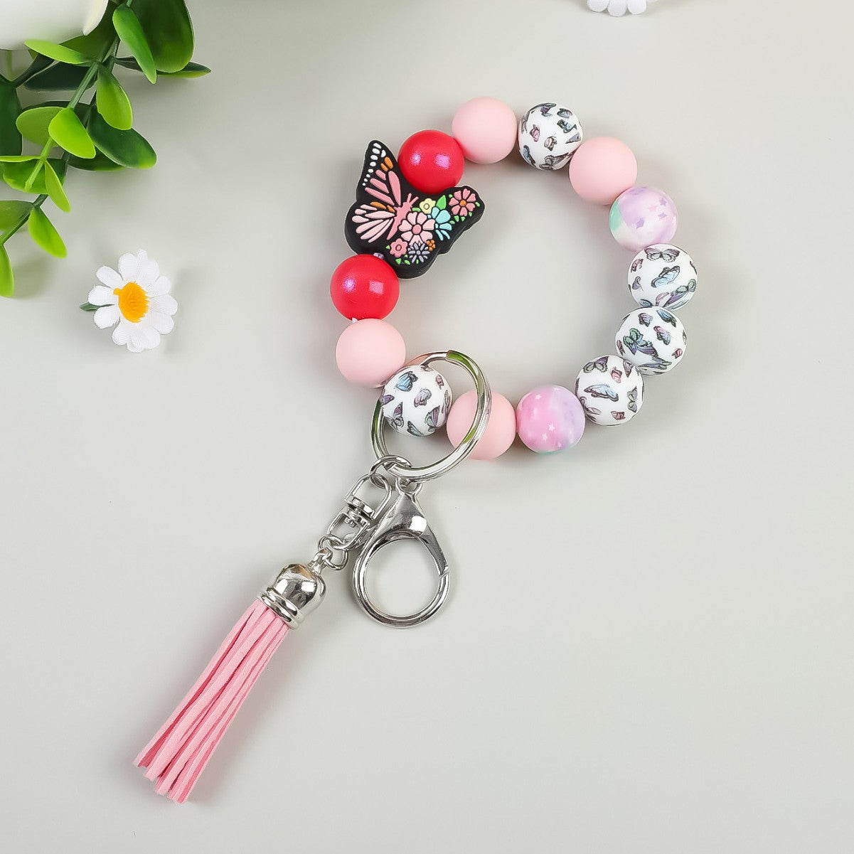 Wholesale Butterfly Pendant Beaded Wristlet Keychain Solid Color Silicone Wooden Keychain