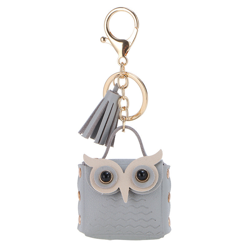 Wholesale Owl Bluetooth Headphones Artificial Leather Storage Bag Keychain