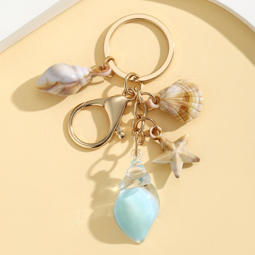Wholesale Seaside vacation luminous conch Acrylic keychain