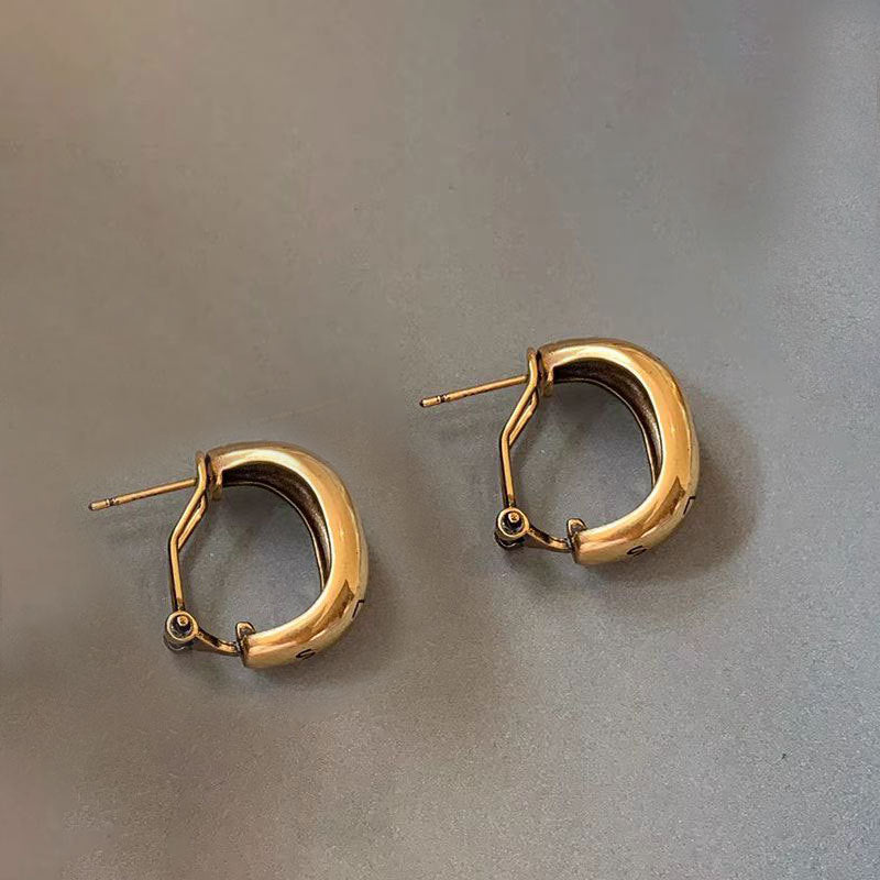 Wholesale Gold and silver retro letter Hong Kong style temperament distressed earrings