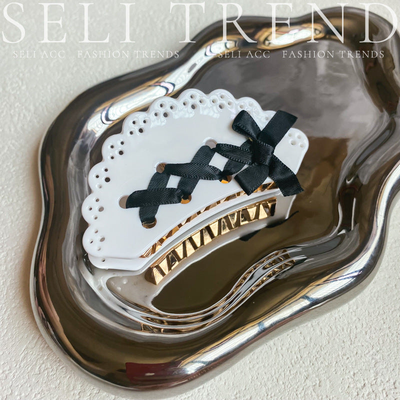 Wholesale Sweet and Cool Bow Hollow Letter Clip