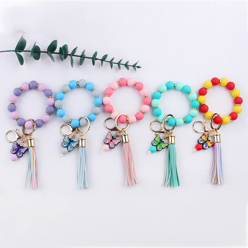 Wholesale PU Tassel Beaded Cartoon Butterfly Pendant Rainbow Leather Keychain