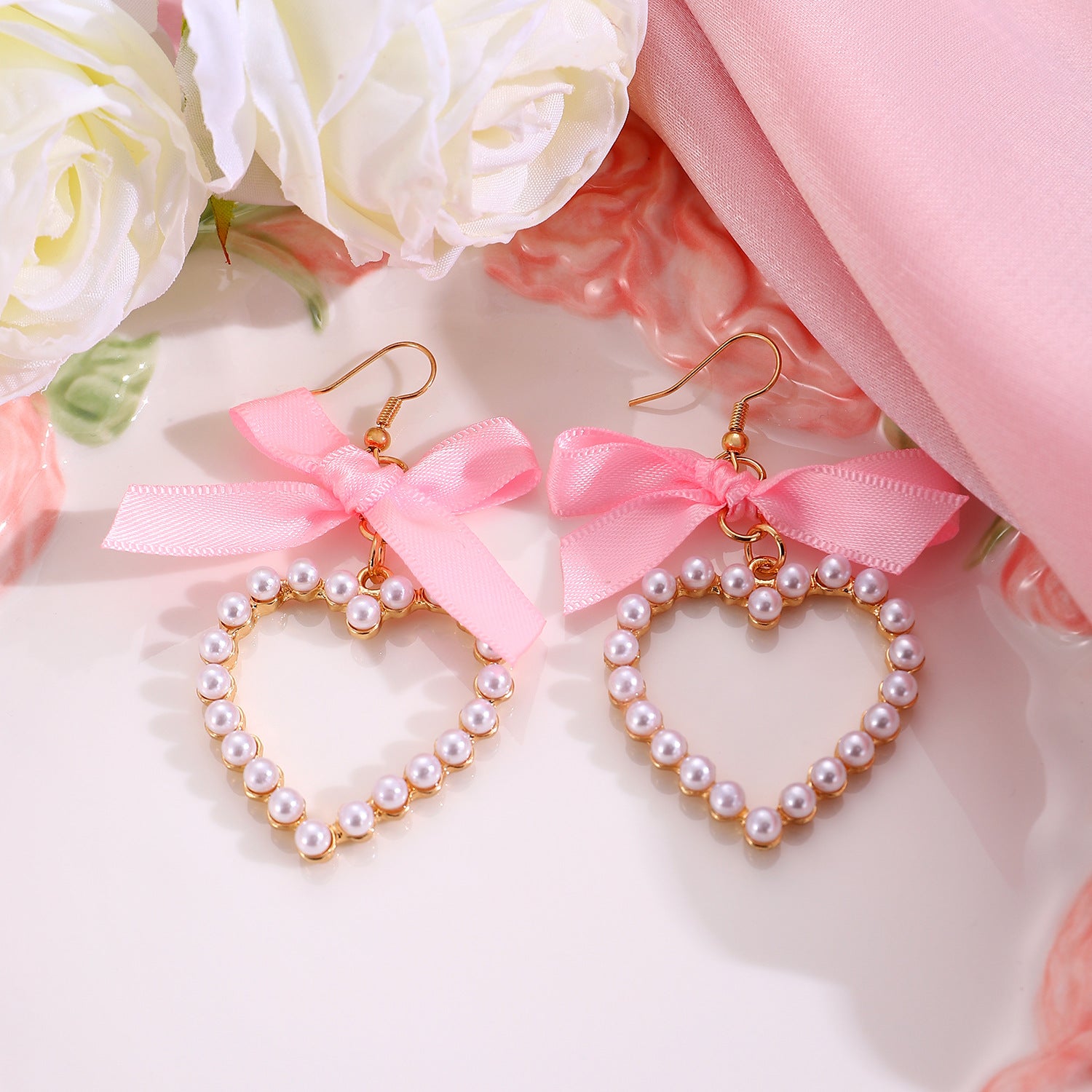 Wholesale Sweet bowknot ribbon pearl heart earrings