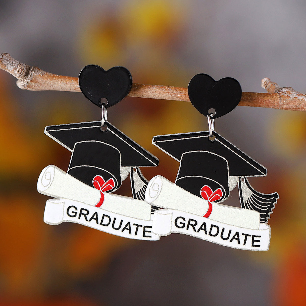 Acrylic pendant earrings for the graduation season of the school season