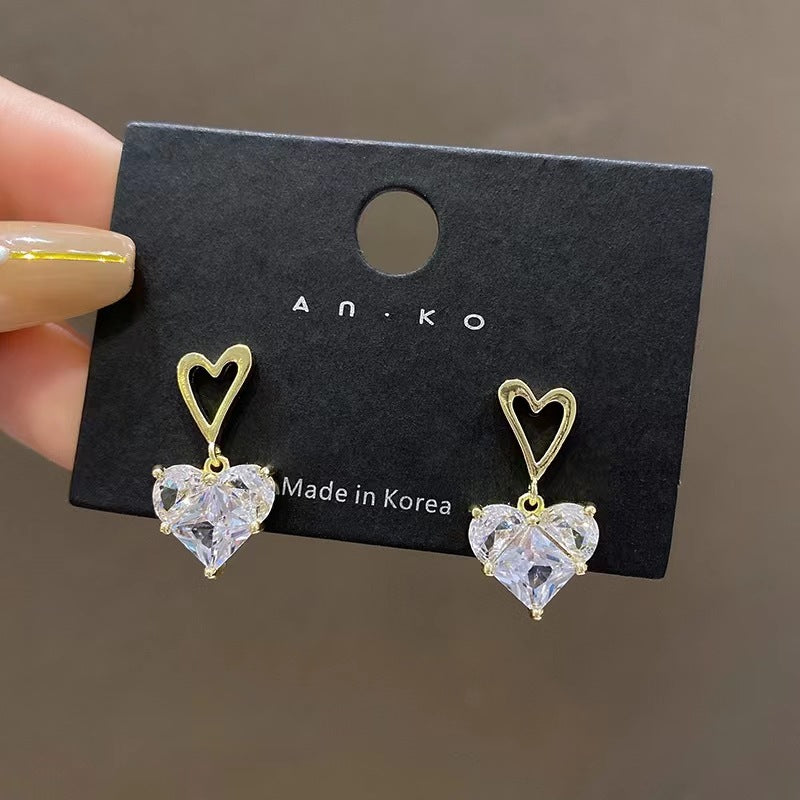 Wholesale Romantic heart-shaped peach pink earrings, fresh and sweet, simple and cool, super shiny earrings