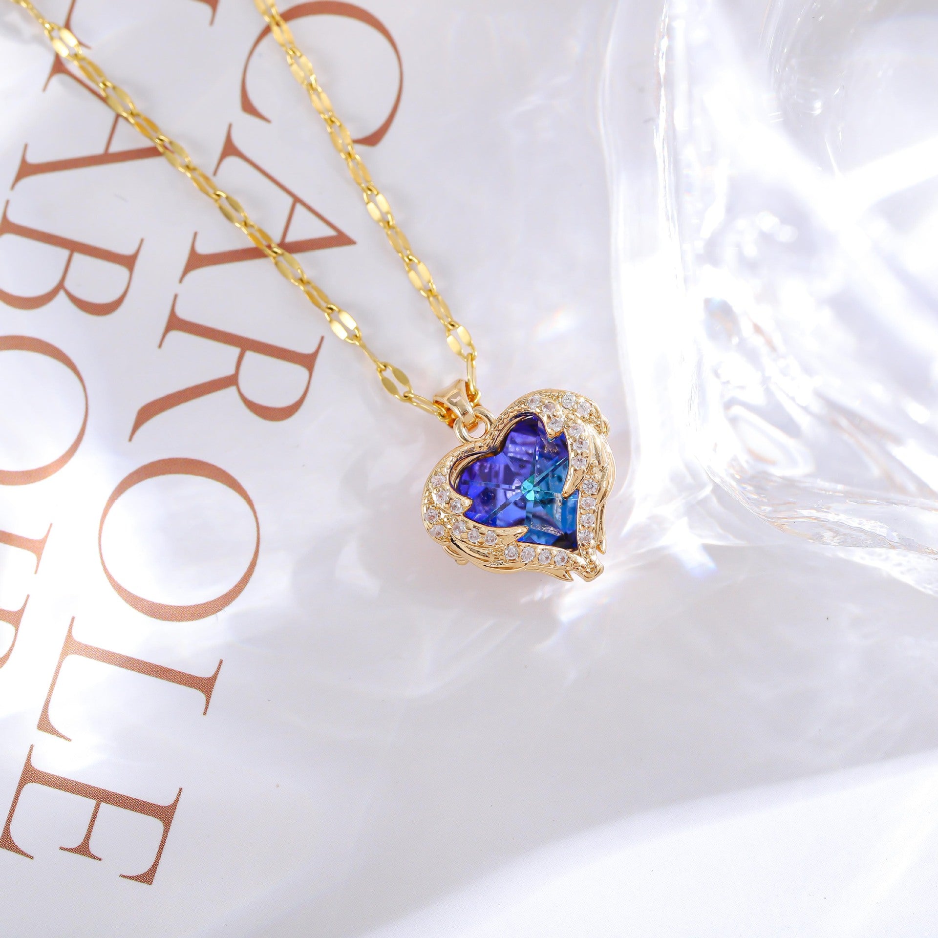 Wholesale titanium steel gold plated silver plated blue crystal ocean heart necklace