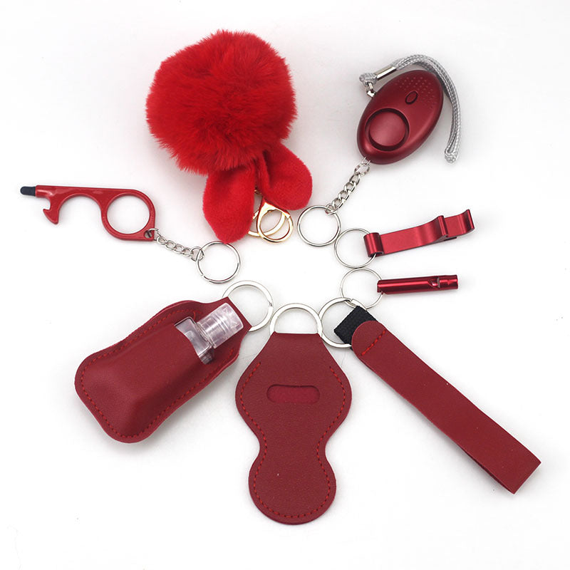 Wholesale Outdoor Whistle Hand Sanitizer Leather Case Fur Ball Key Chain Set
