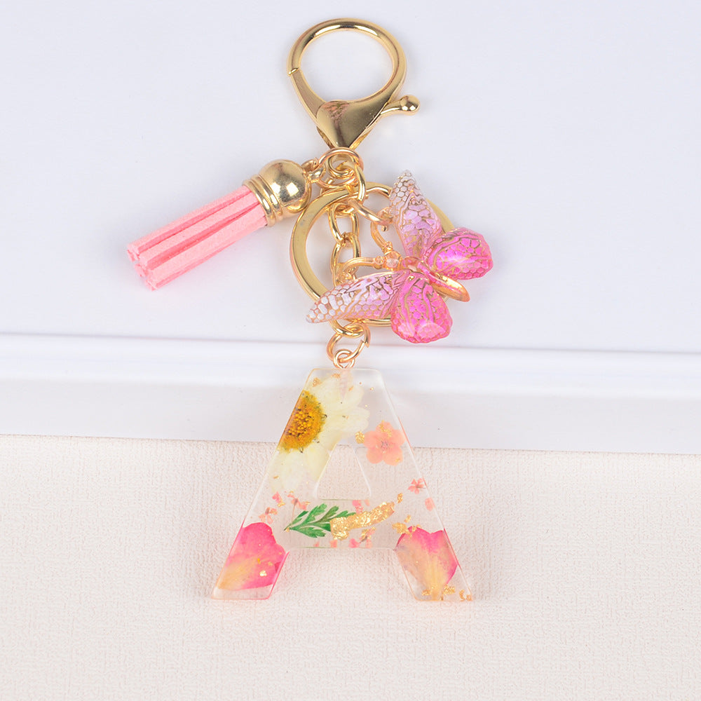 卸売ドライフラワーレター樹脂キーホルダー