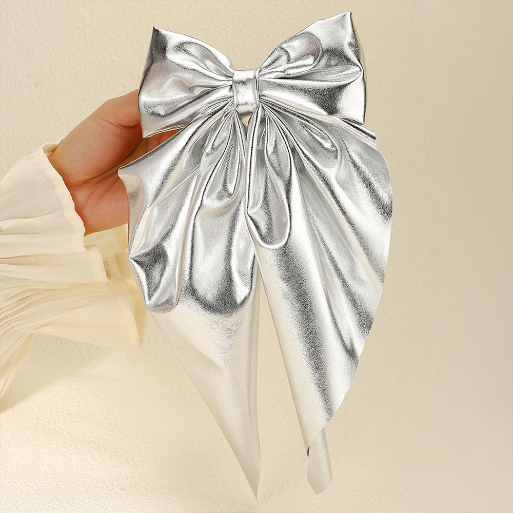 Wholesale Shiny leather bow hairpin long ribbon spring clip