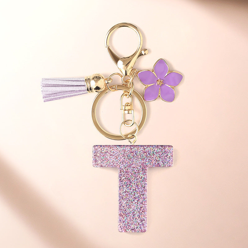 Wholesale Sparkling Pink 26 English Letter Purple Flower Keychain