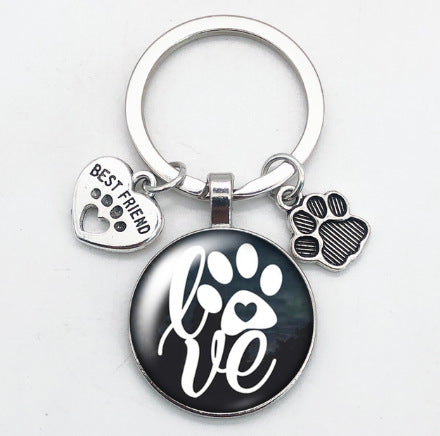 卸売愛猫ペットの足跡犬ガラス凸ラウンド金属キーホルダー