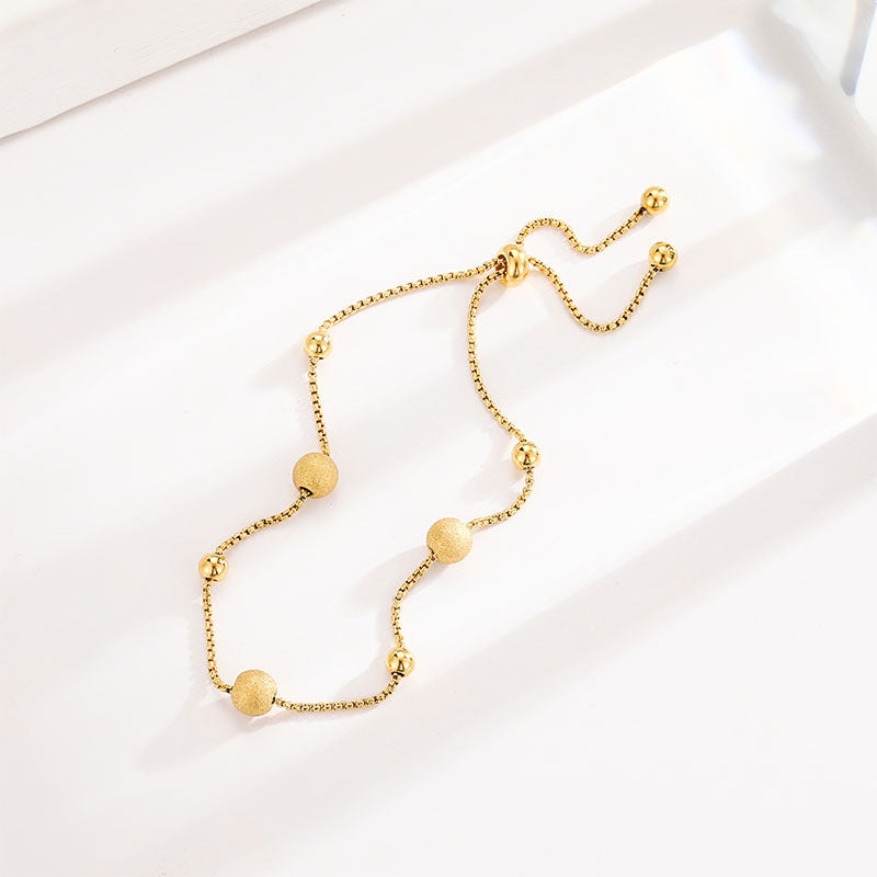 Wholesale Fashion Small Gold Bead Pull-out Titanium Steel Bracelet