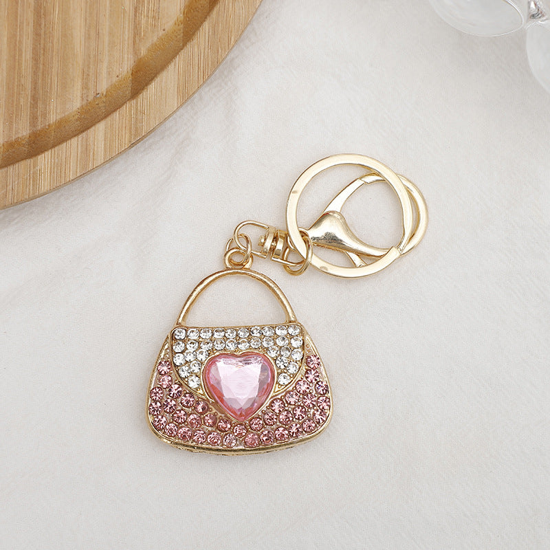 Wholesale Zinc Alloy Rhinestone Lipstick Perfume Bottle Keychain