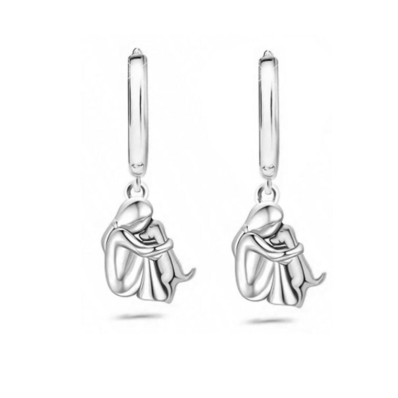 Wholesale Cute girl and dog embracing earrings