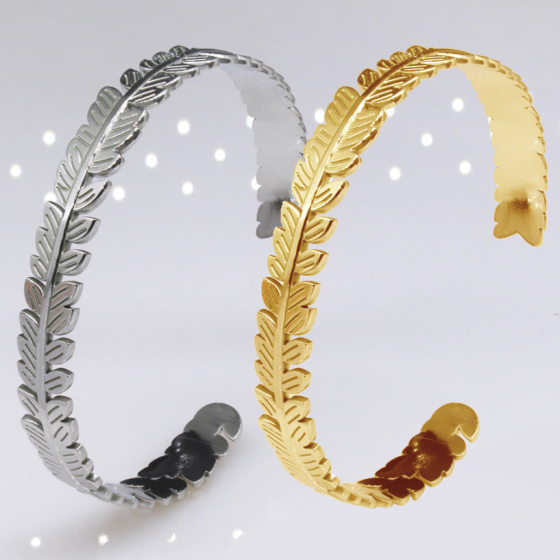 Hoja del árbol al por mayor C de forma de acero inoxidable ajustable brazalete de titanio