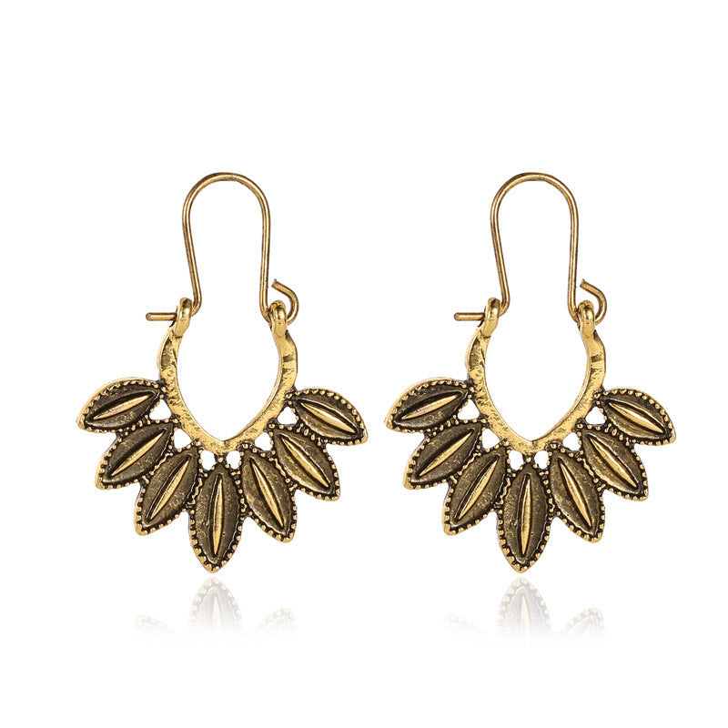 Wholesale Retro Metal Hollow Flower Bohemian Carved Court Style Earrings