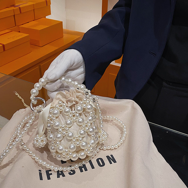 Wholesale Fresh and sweet pearl woven small bag fashionable and stylish handbag