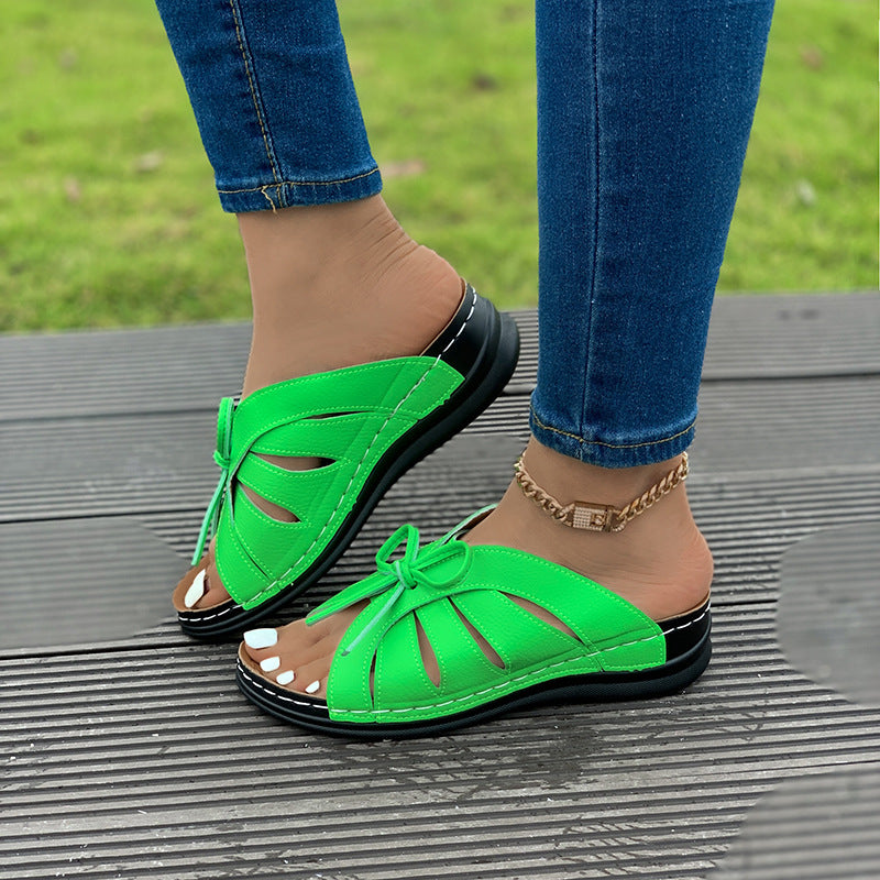 Wholesale Bow Flat Slopes and Hollow Fish Mouth Slippers