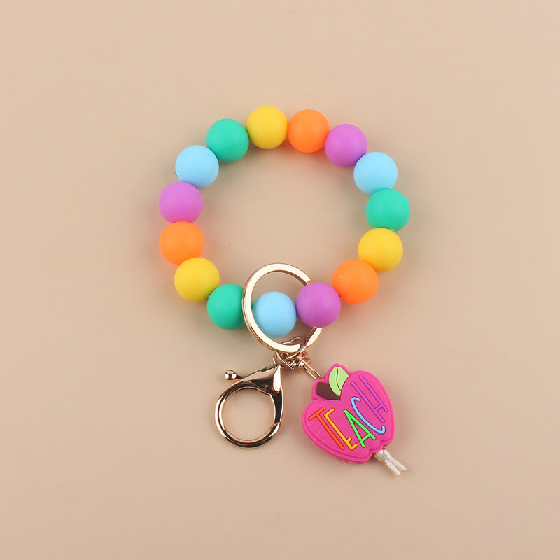 Wholesale Cartoon Apple Teacher Pencil Silicone Beaded Wrist Keychain