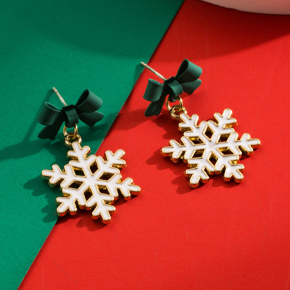 Wholesale The New Christmas Elements Are Fashionable and Versatile, and The Cut-out Snowflake Bow Dripping Oil Earrings