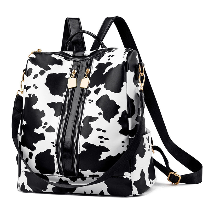 Wholesale Cow Pattern PU Retro Large Capacity Travel Backpack