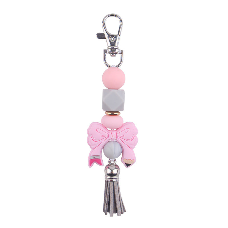 Wholesale Bow Silicone PU Short Tassel Keychain