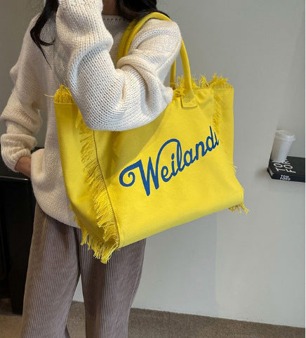 Wholesale Letter Tassel Simple Commuter Large Capacity Shoulder Canvas Bag