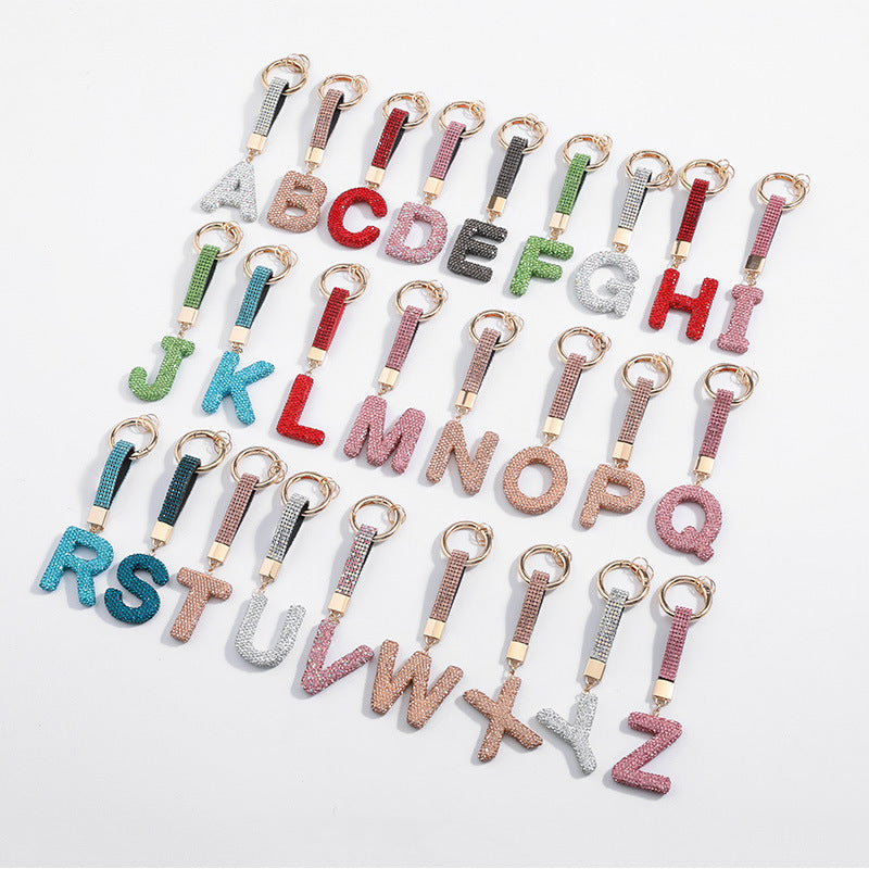 Wholesale Pottery Clay Water Diamond Alloy Dot Diamond Letter Keychain