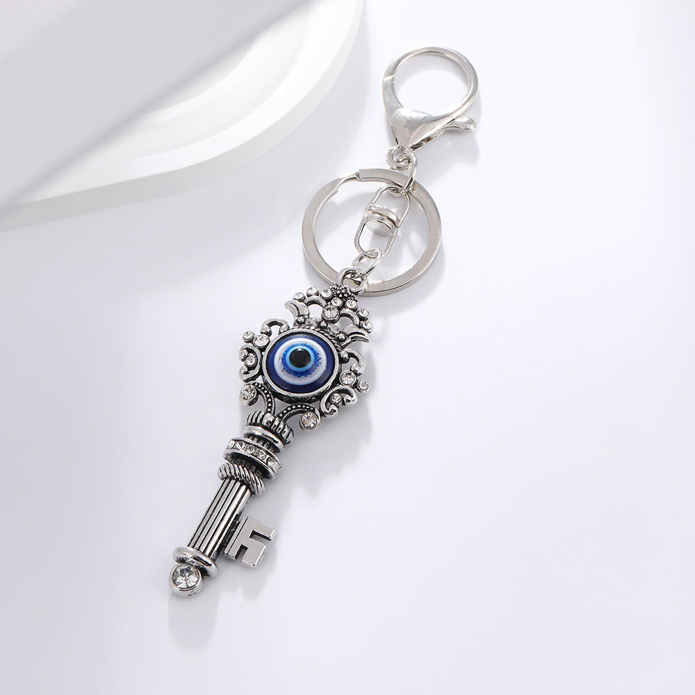 Wholesale Devil' s Eye Key Shape with Water Diamond Metal Keychain