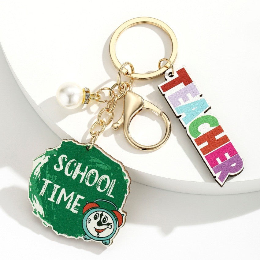 Wholesale Campus style graduation season wooden book keychain