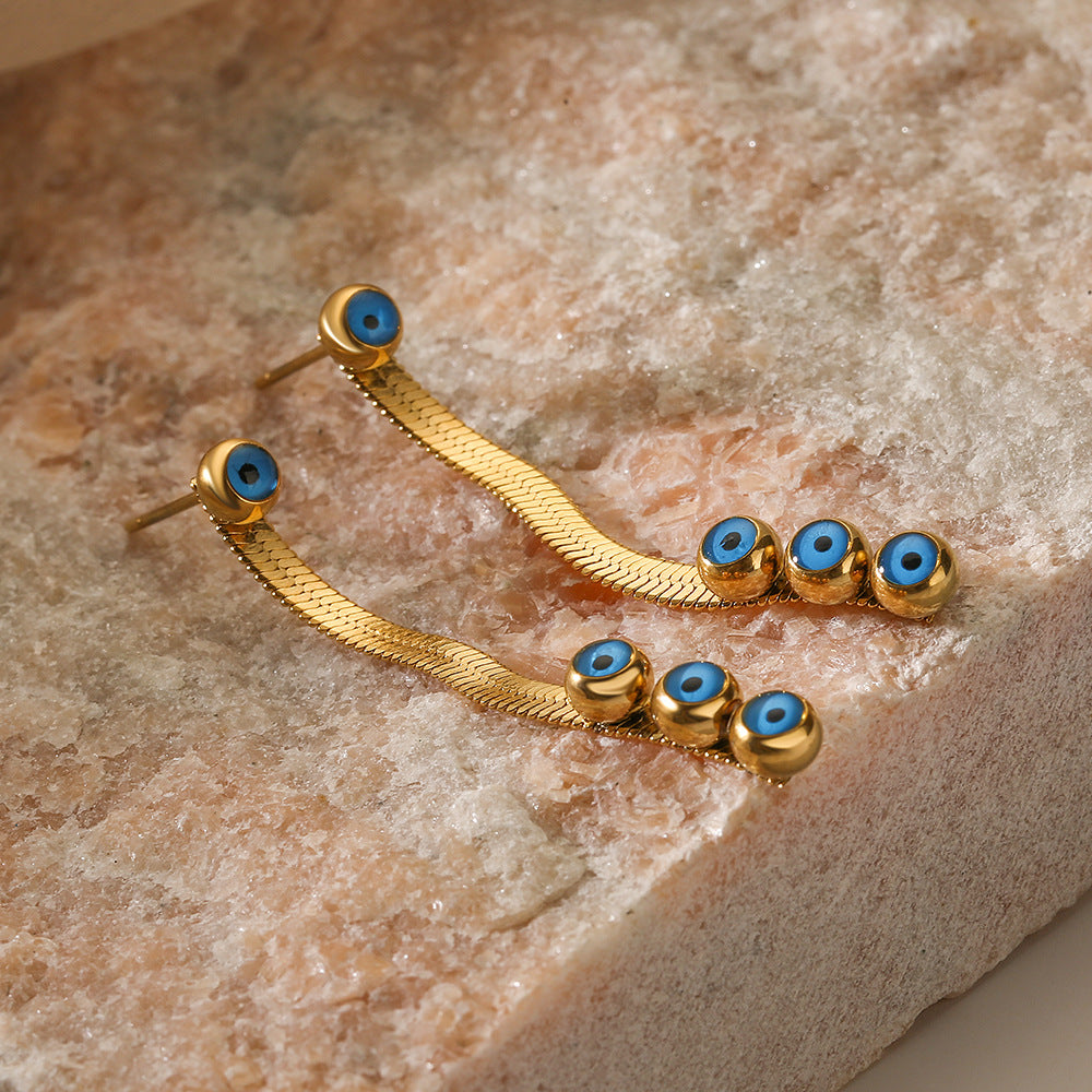 Wholesale Drip Oil Tree Leaf Blue Eyes Long Earrings