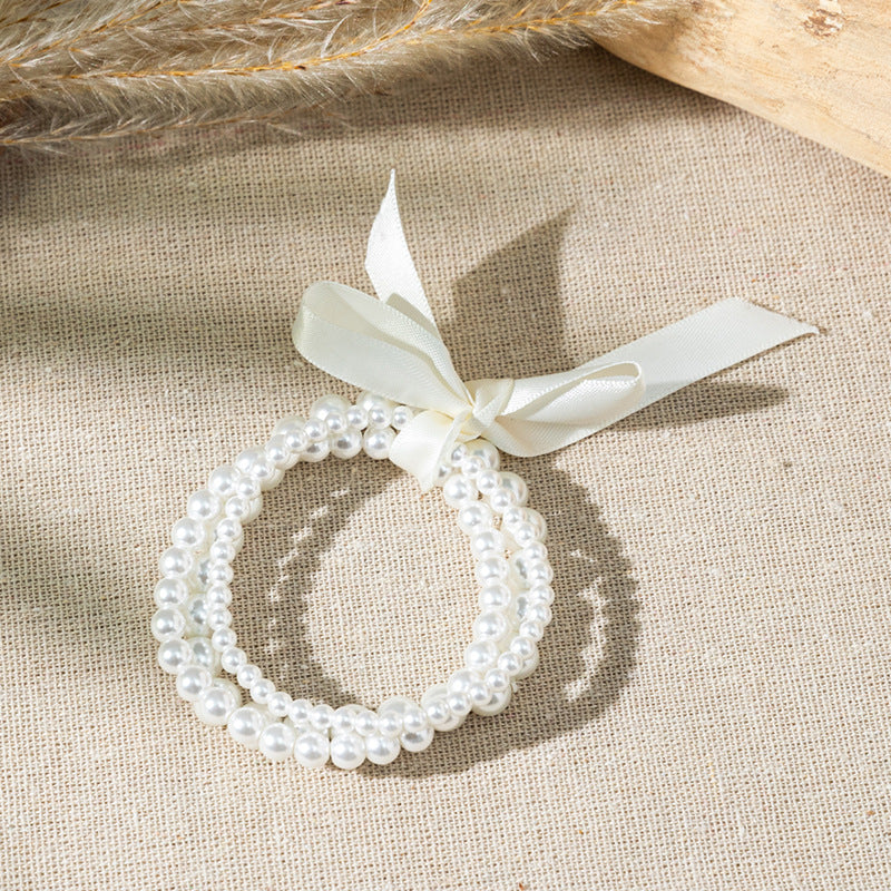 Wholesale Bow colored pearl Layered Bracelet Set